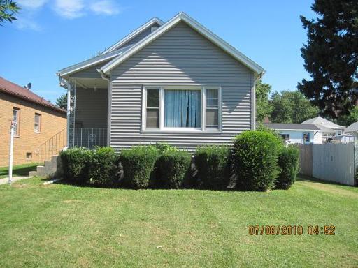 426 West Devlin Street Spring Valley, IL 61362 - Photo 1 of 1 a view of a house with a yard and plants