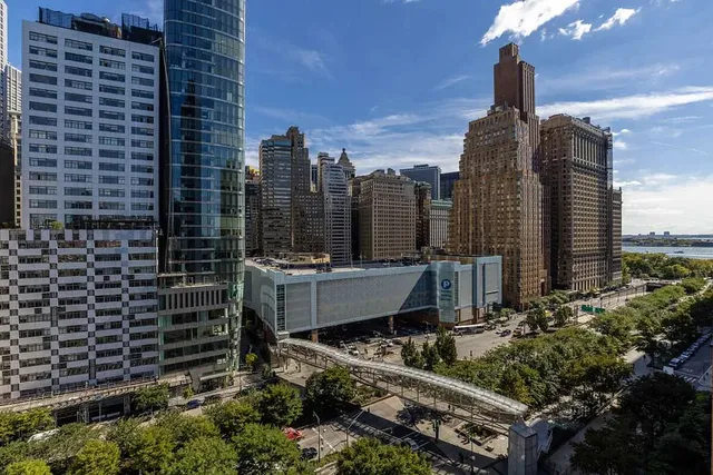 a bathroom with a sink toilet vanity and bathtub