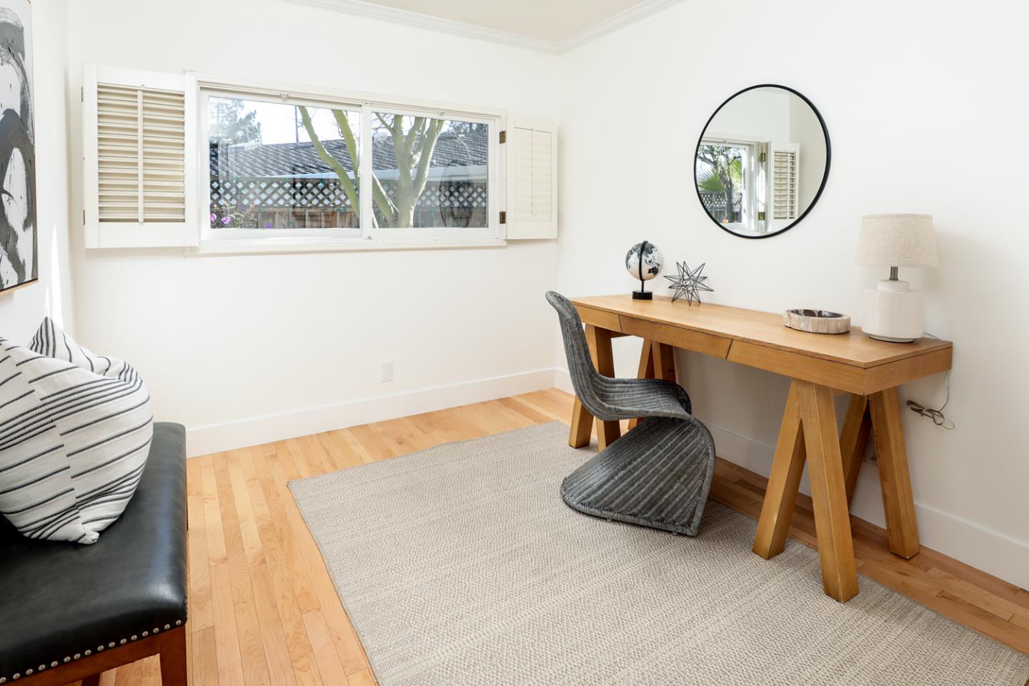 735 Ashbourne Drive Sunnyvale, CA 94087 - Photo 13 of 25 a view of a room with furniture and a window