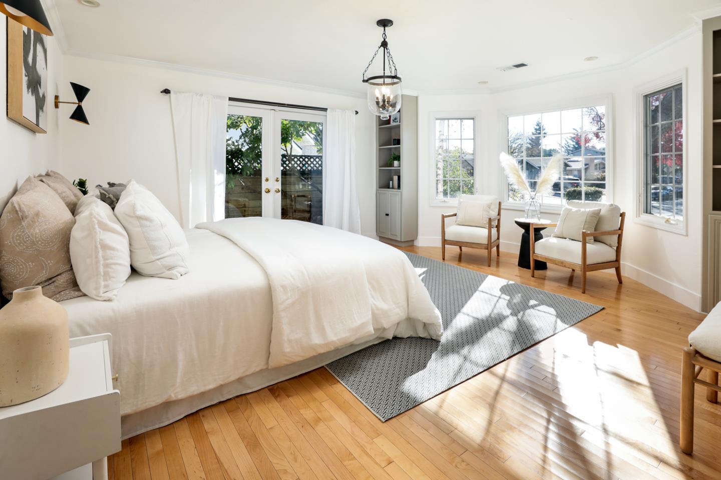 735 Ashbourne Drive Sunnyvale, CA 94087 - Photo 15 of 25 a large bed sitting in a bedroom next to a window