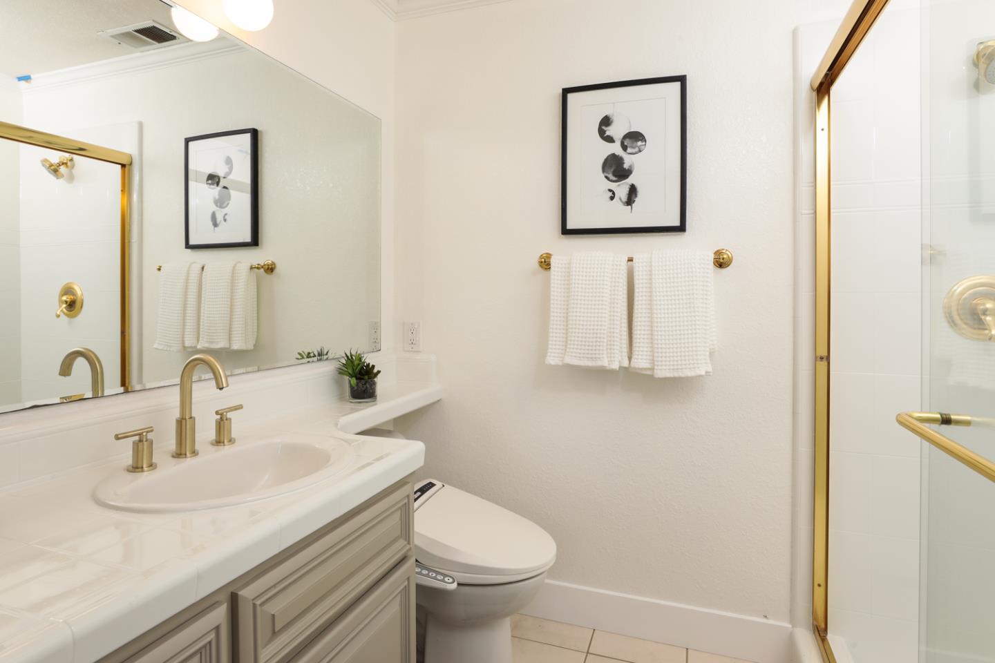 735 Ashbourne Drive Sunnyvale, CA 94087 - Photo 19 of 25 a bathroom with a sink and a toilet