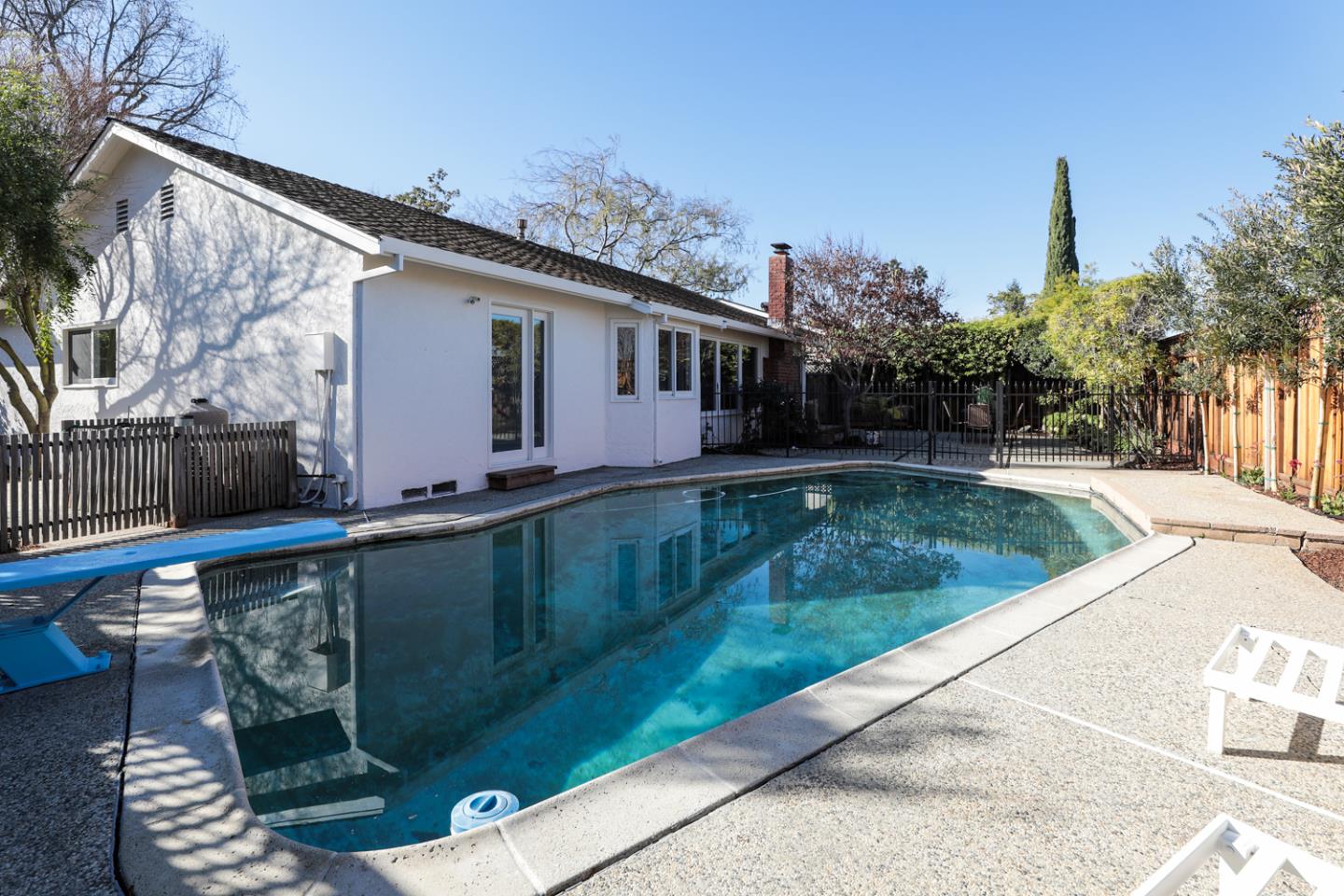 735 Ashbourne Drive Sunnyvale, CA 94087 - Photo 25 of 25 a view of a swimming pool with a patio