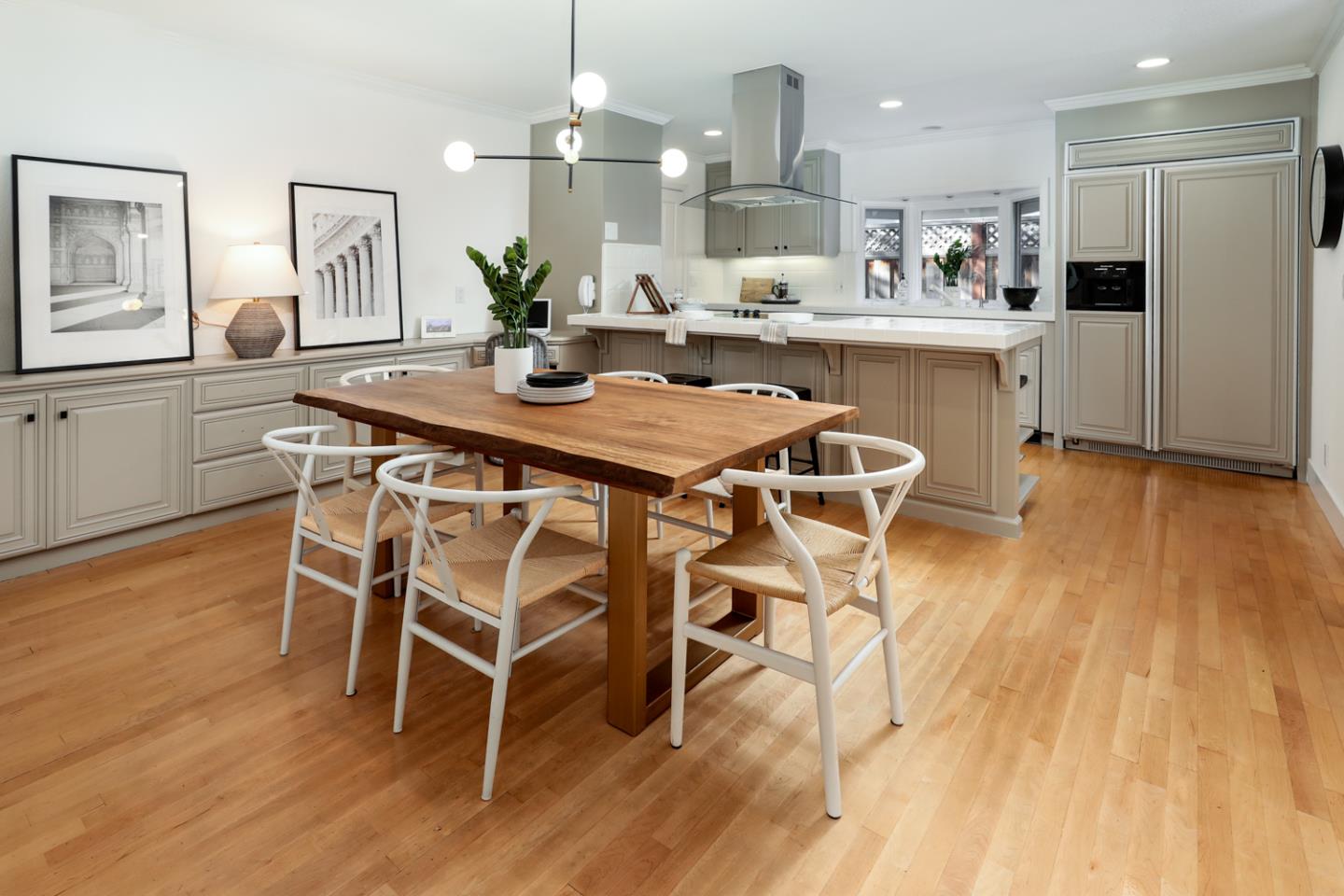 735 Ashbourne Drive Sunnyvale, CA 94087 - Photo 6 of 25 a view of a dining room with furniture and wooden floor