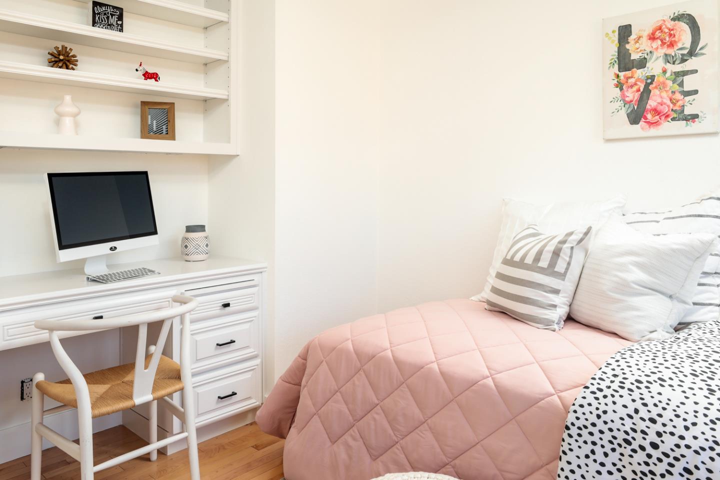 735 Ashbourne Drive Sunnyvale, CA 94087 - Photo 10 of 25 a bedroom with a bed and a flat screen tv