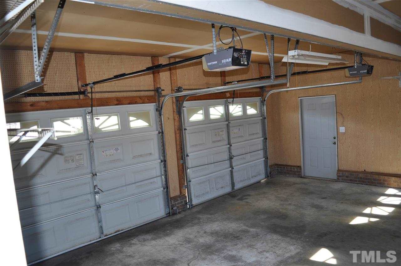 1113 Holland Ridge Drive Raleigh, NC 27603 - Photo 20 of 24 a view of a garage