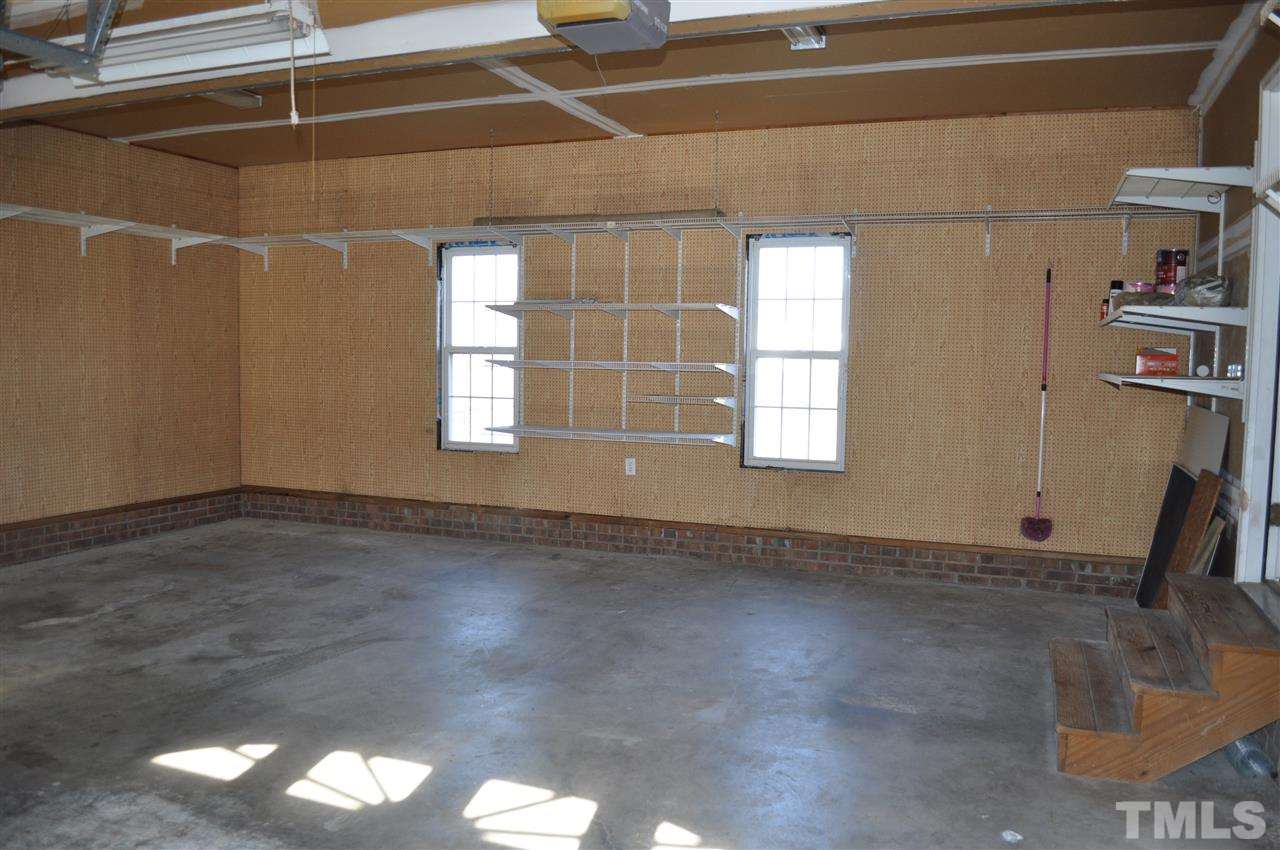 1113 Holland Ridge Drive Raleigh, NC 27603 - Photo 21 of 24 a view of an empty room with a window
