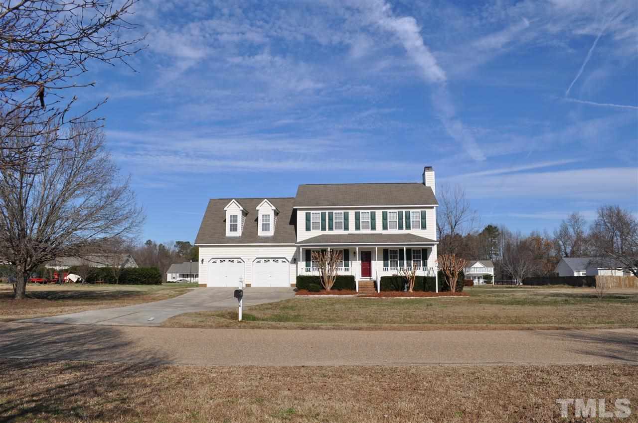 1113 Holland Ridge Drive Raleigh, NC 27603 - Photo 24 of 24 a front view of a house with a yard