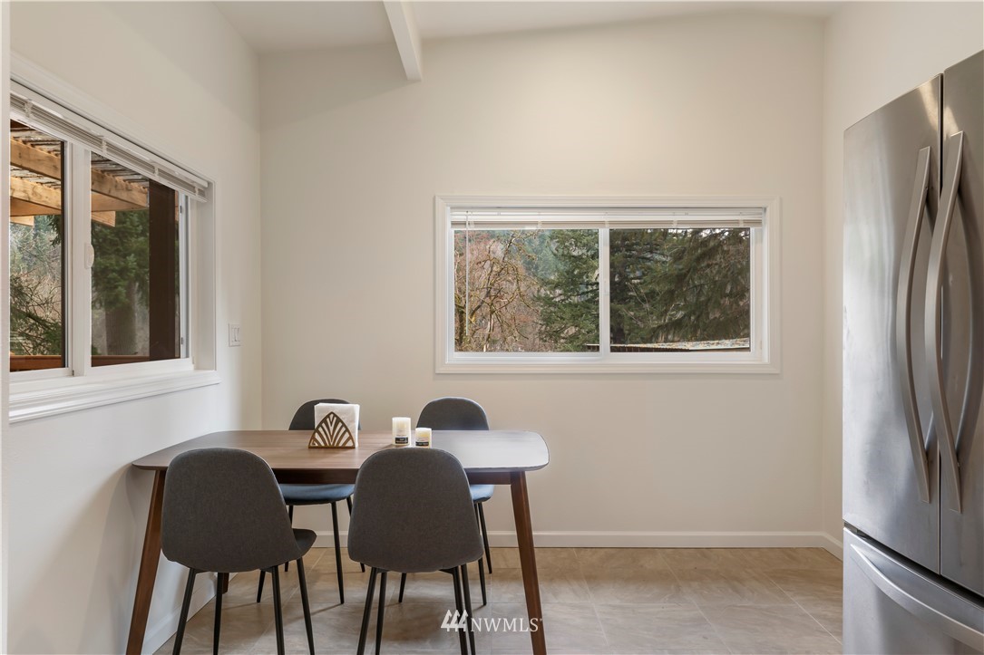 15612 Renton Issaquah Road Southeast Renton, WA 98059 - Photo 6 of 30 a dining room with furniture and window