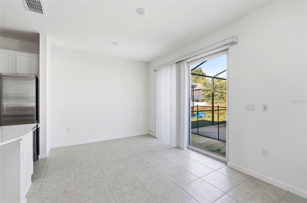 4483 Monado Drive Kissimmee, FL 34746 - Photo 14 of 43 an empty room with windows