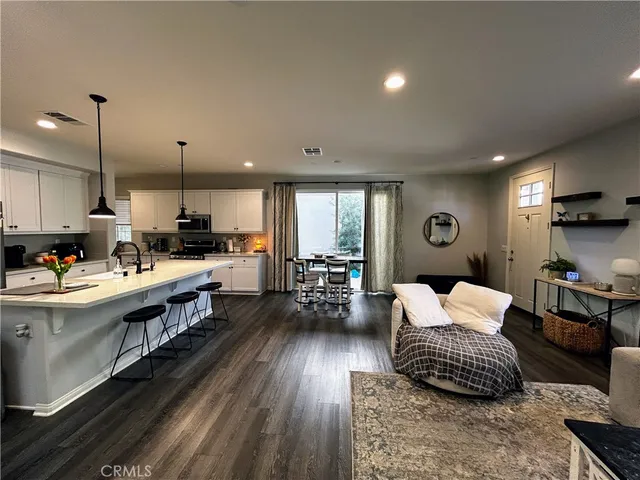 a kitchen with a stove and cabinets