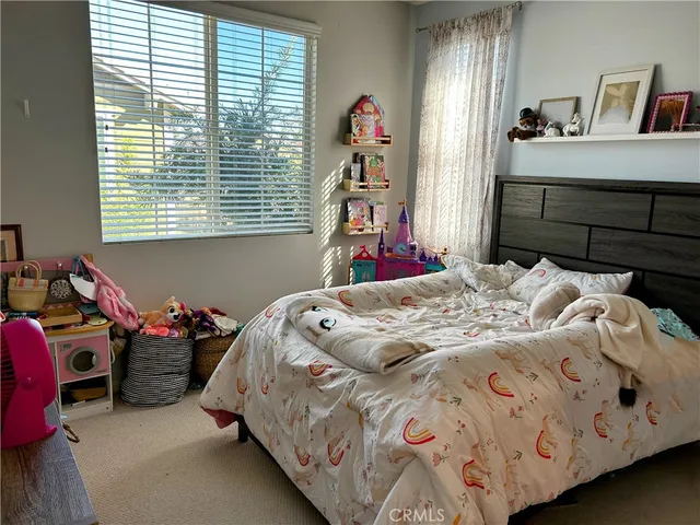 a couple of potted plants in front of a door