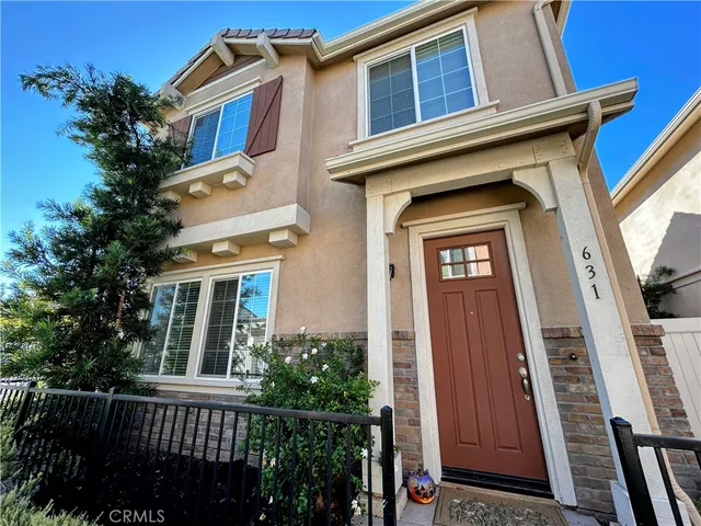 a view of a house with a small porch