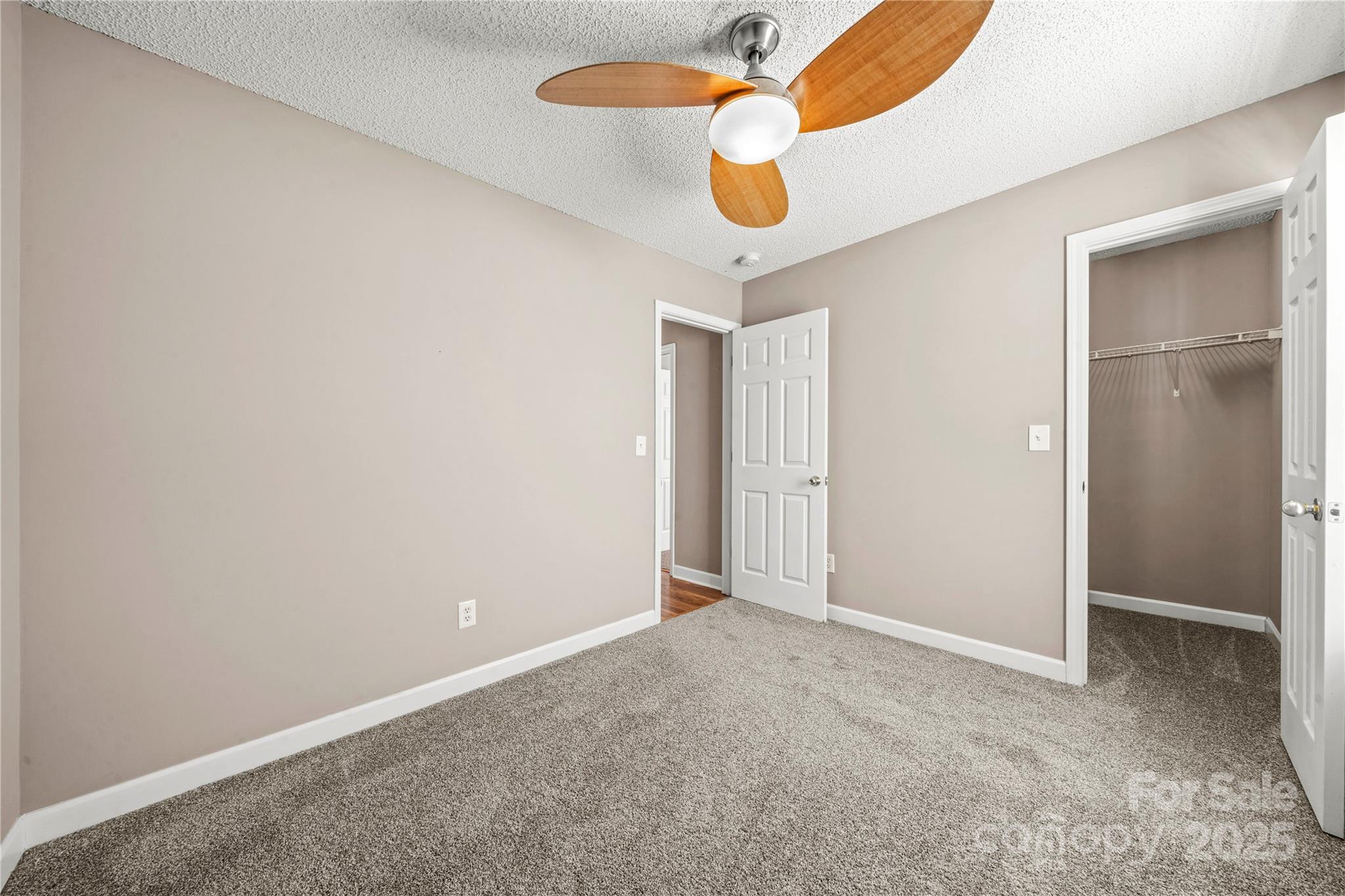 925 Anchor Way Northeast Kannapolis, NC 28083 - Photo 15 of 23 an empty room with closet and wooden floor