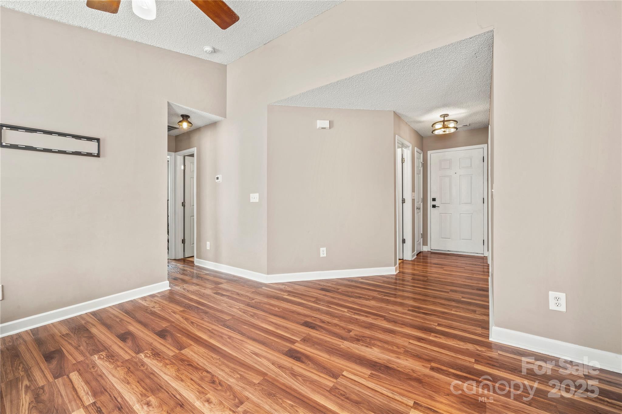 925 Anchor Way Northeast Kannapolis, NC 28083 - Photo 7 of 23 a view of a livingroom with wooden floor