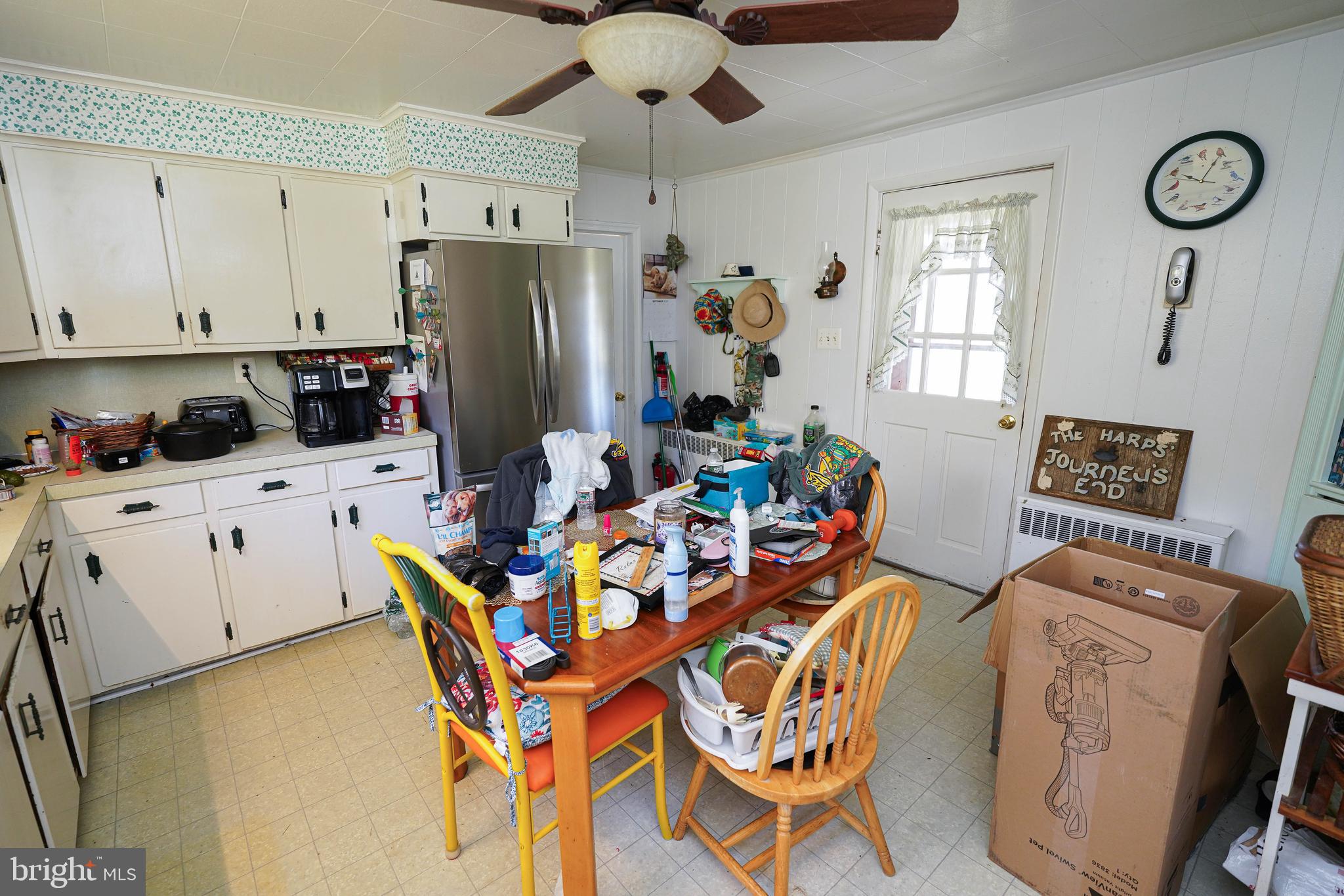 23392 Custom House Road Deal Island, MD 21821 - Photo 15 of 44 a work place with a chandelier fan and a window