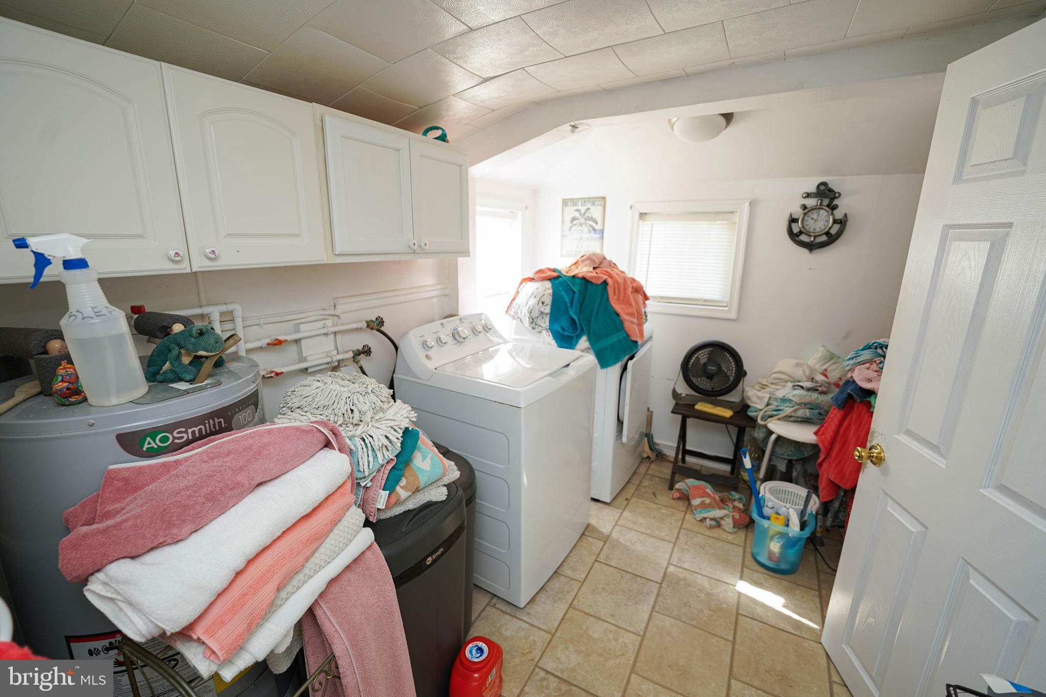 23392 Custom House Road Deal Island, MD 21821 - Photo 19 of 44 a room with storage and utility