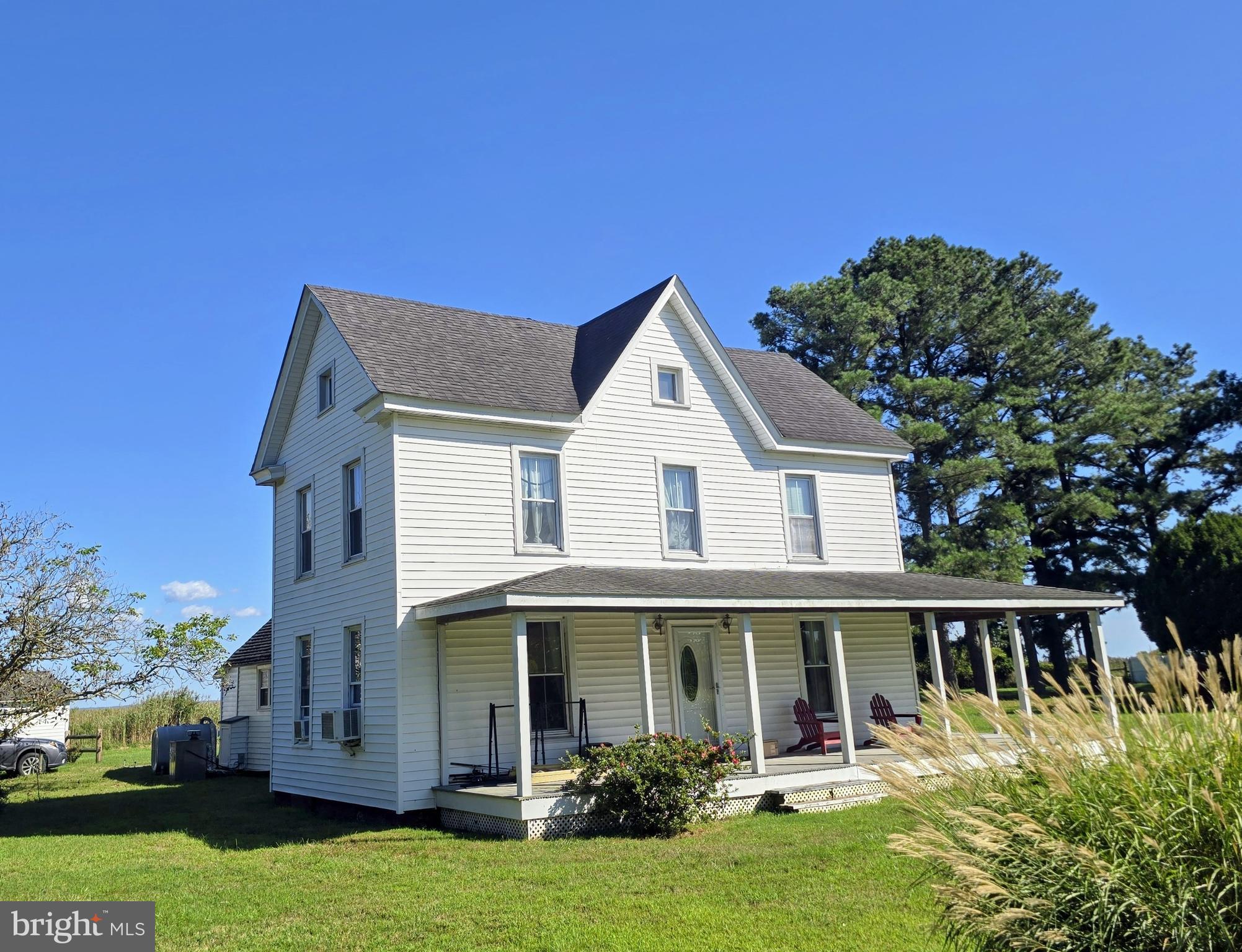 23392 Custom House Road Deal Island, MD 21821 - Photo 2 of 44 a front view of a house with a yard