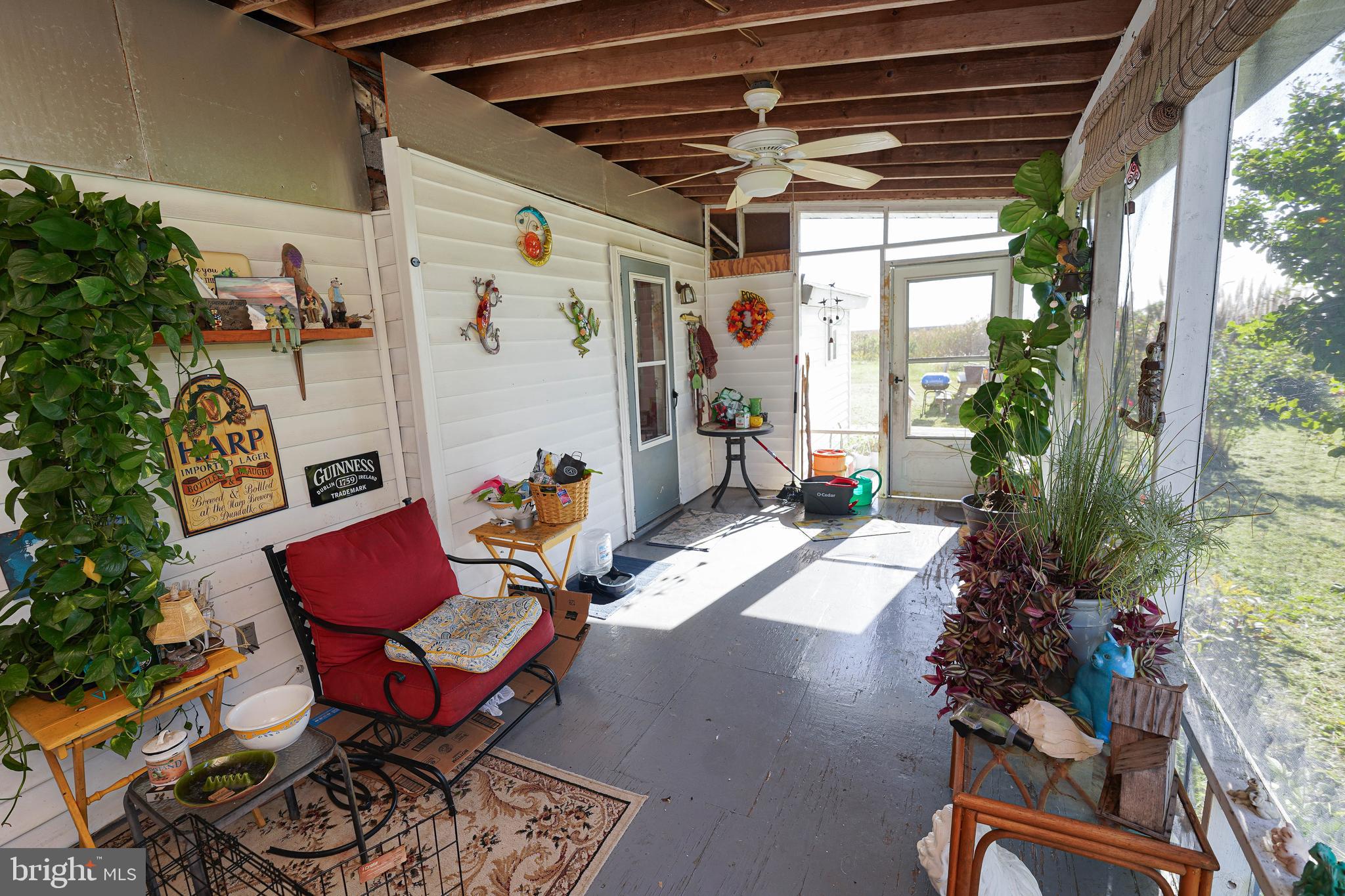 23392 Custom House Road Deal Island, MD 21821 - Photo 22 of 44 a building outdoor space with patio furniture