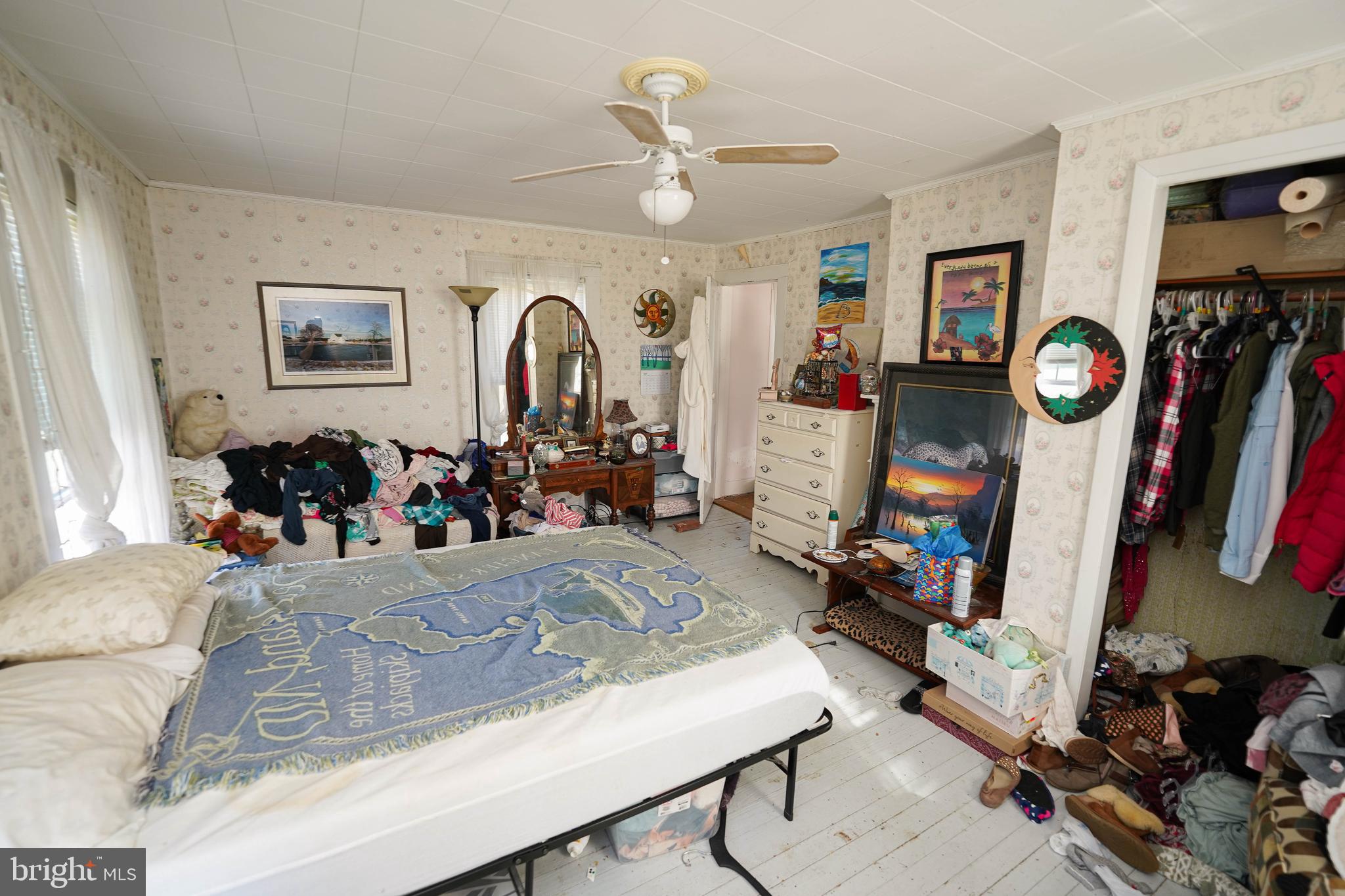 23392 Custom House Road Deal Island, MD 21821 - Photo 29 of 44 a view of a livingroom with furniture and a flat screen tv