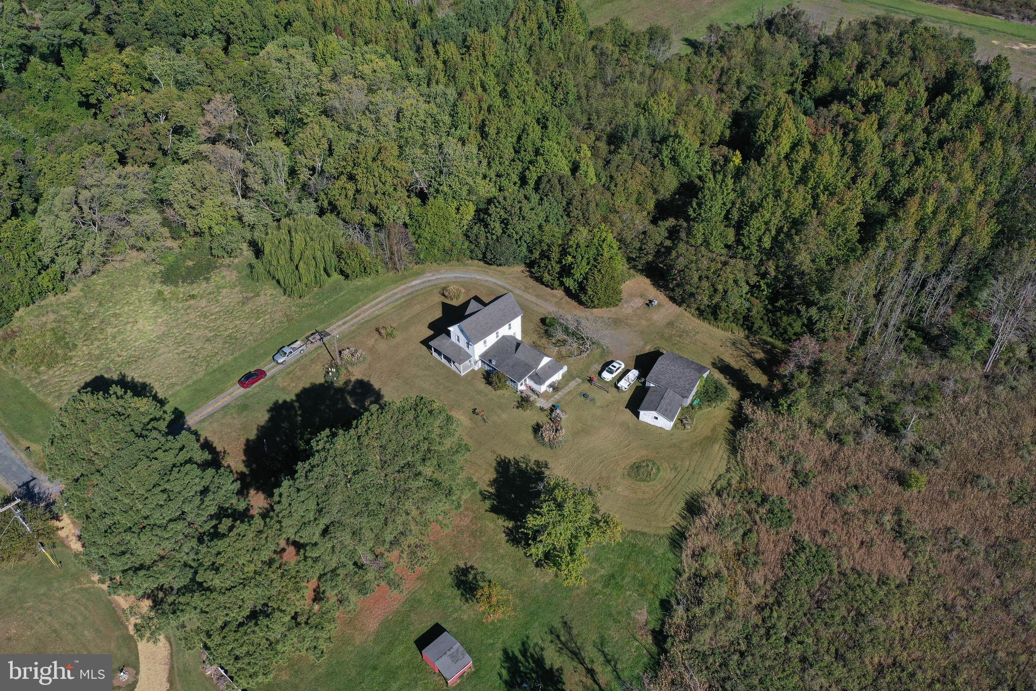 23392 Custom House Road Deal Island, MD 21821 - Photo 39 of 44 an aerial view of a house with a yard