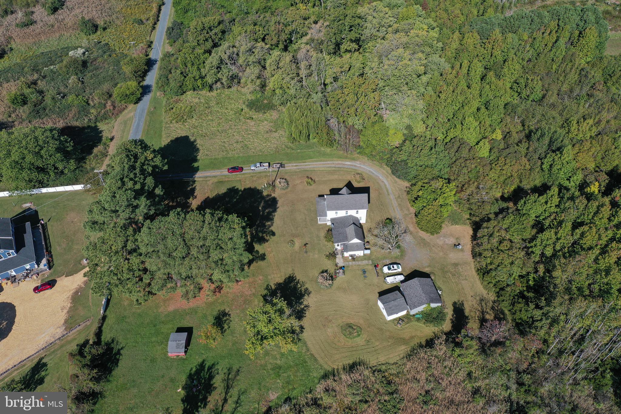 23392 Custom House Road Deal Island, MD 21821 - Photo 43 of 44 an aerial view of a house with a yard