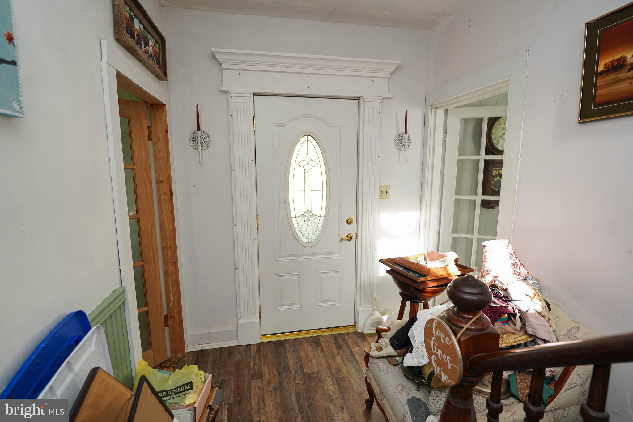 23392 Custom House Road Deal Island, MD 21821 - Photo 7 of 44 a view of a room with wooden floor mirror and windows