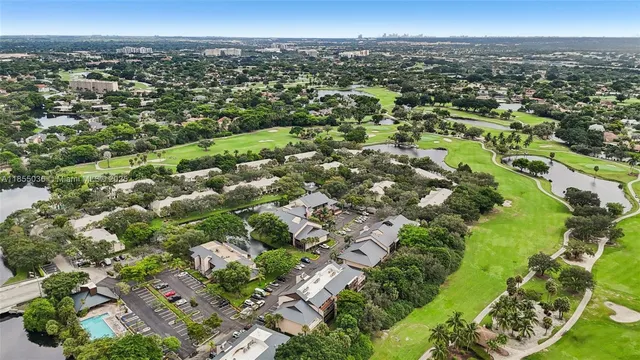 an aerial view of residential house with outdoor space