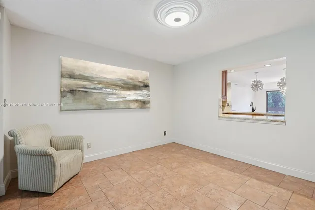 a view of livingroom with furniture and window