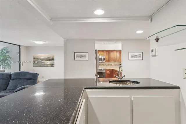 a living room with furniture and window
