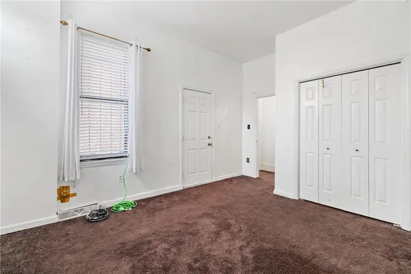 a view of an empty room with window