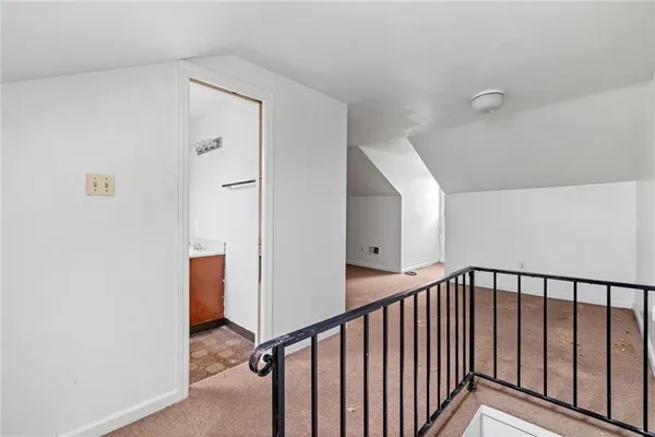 a view of a hallway with entryway