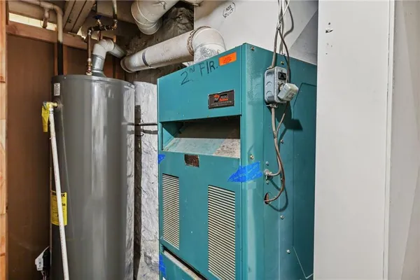 a backyard of a house with outdoor seating