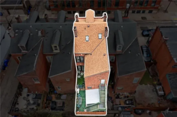 an aerial view of residential house with parking space