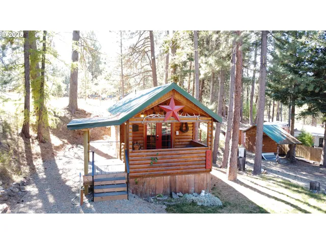 a black and white photo of a house