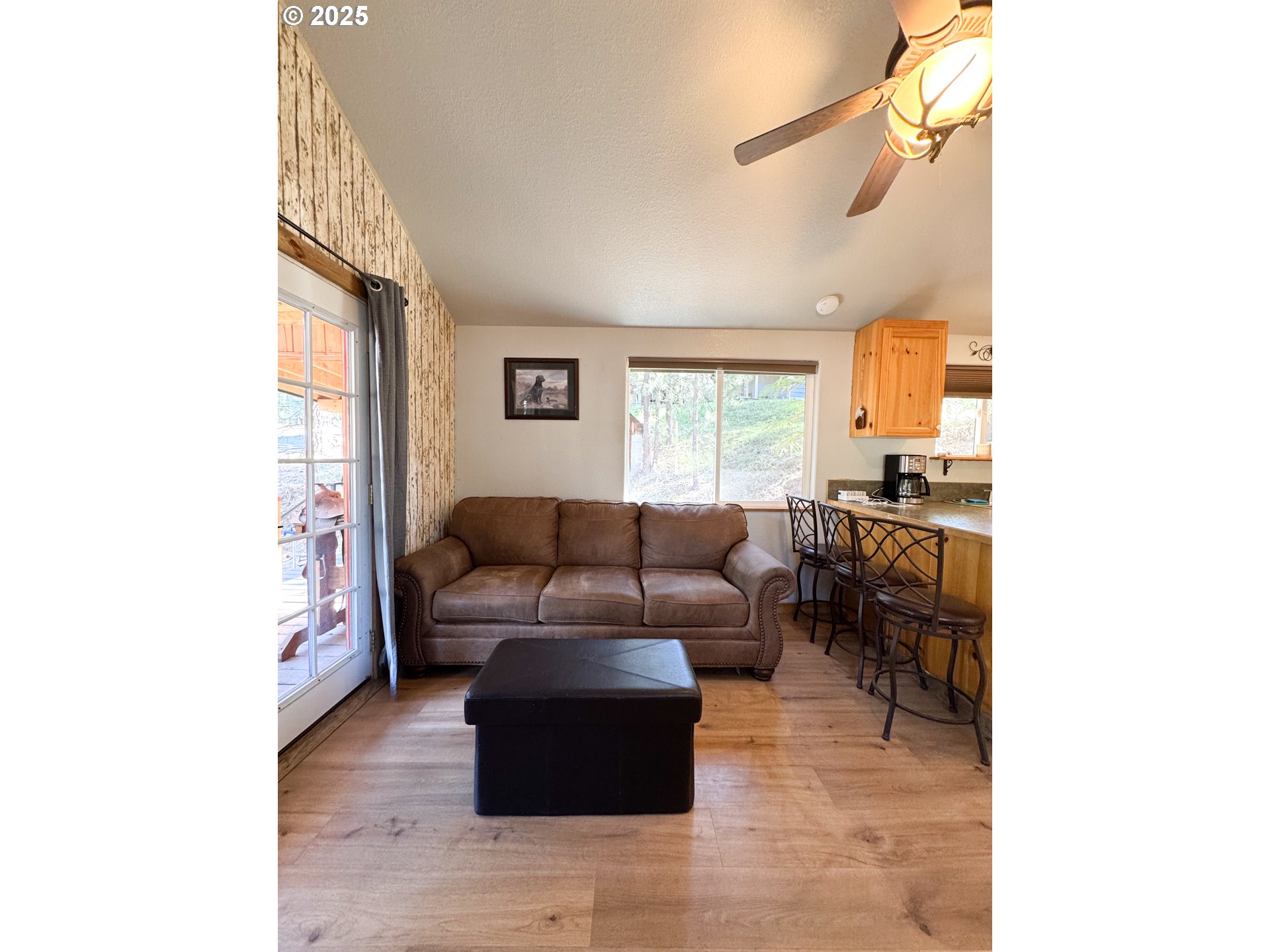 255 East North Street Sumpter, OR 97877 - Photo 6 of 20 a living room with furniture and a window