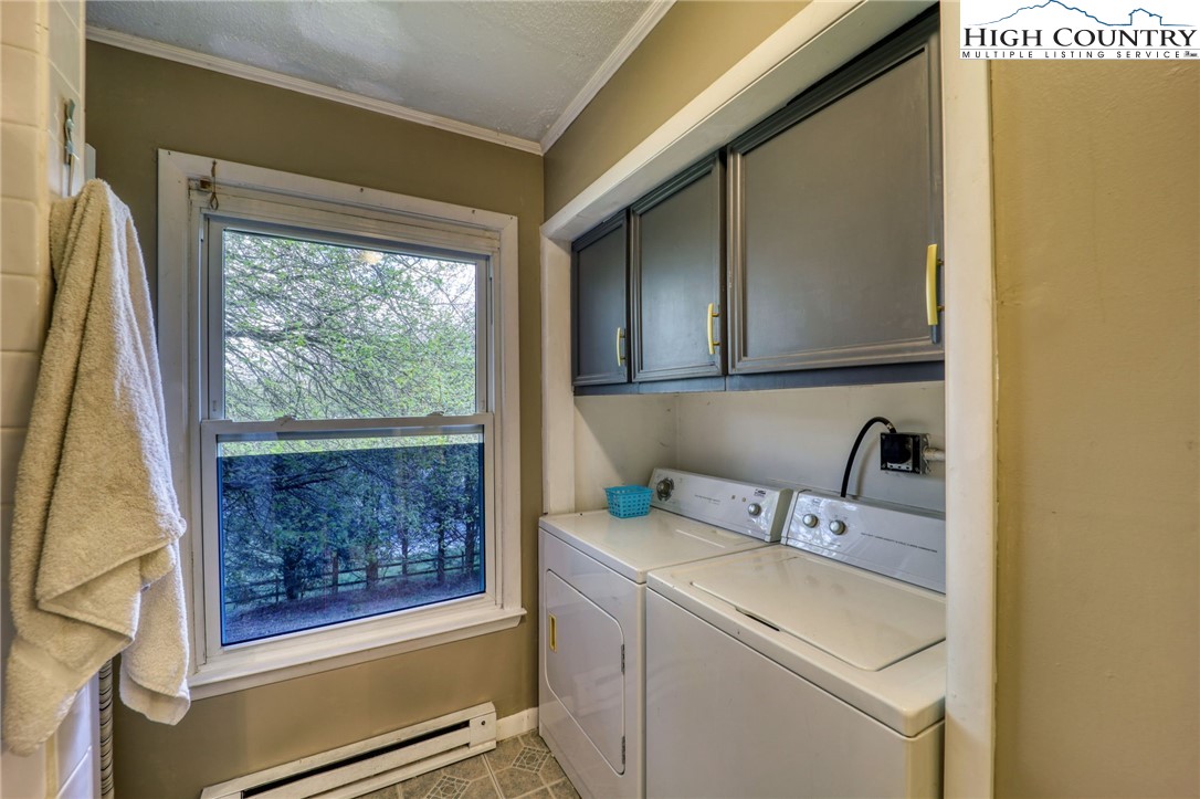 191 Alex Wellborn Road Deep Gap, NC 28618 - Photo 18 of 39 a utility room with dryer and washer