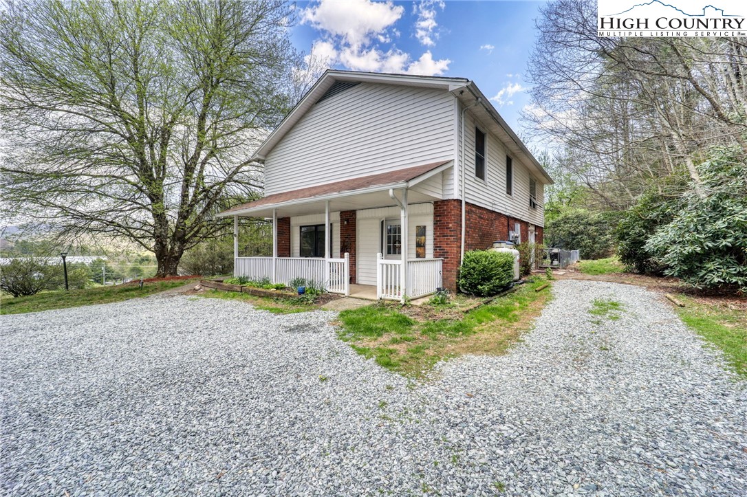 191 Alex Wellborn Road Deep Gap, NC 28618 - Photo 23 of 39 a view of a yard in front of house