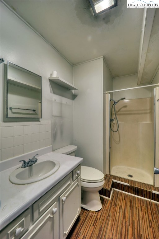 191 Alex Wellborn Road Deep Gap, NC 28618 - Photo 37 of 39 a bathroom with a sink toilet and shower
