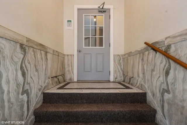a spacious bathroom with a bathtub and shower