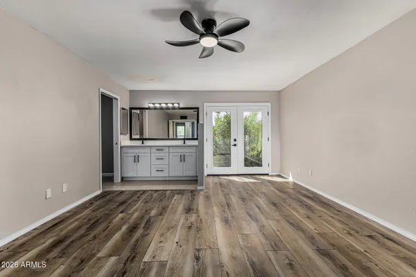 a view of an empty room with a window