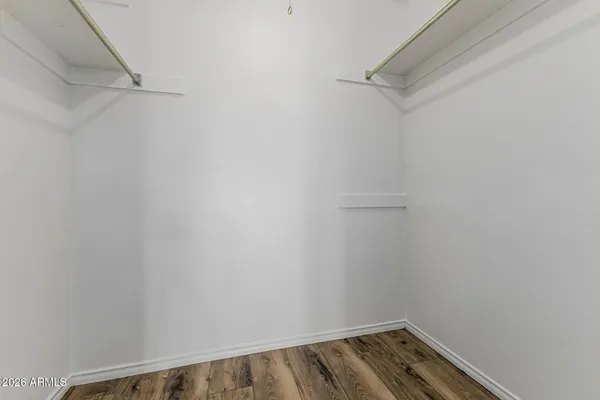 a view of a room with racks on the wall