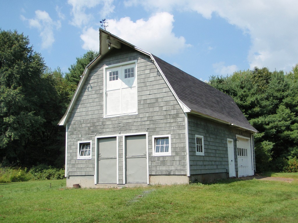 23 Summer Road Boxborough, MA 01719 - Photo 2 of 14 a view of a house with a yard
