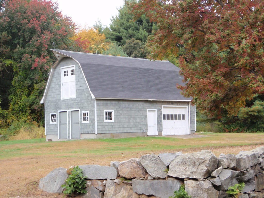 23 Summer Road Boxborough, MA 01719 - Photo 3 of 14 a house with swimming pool in front of it
