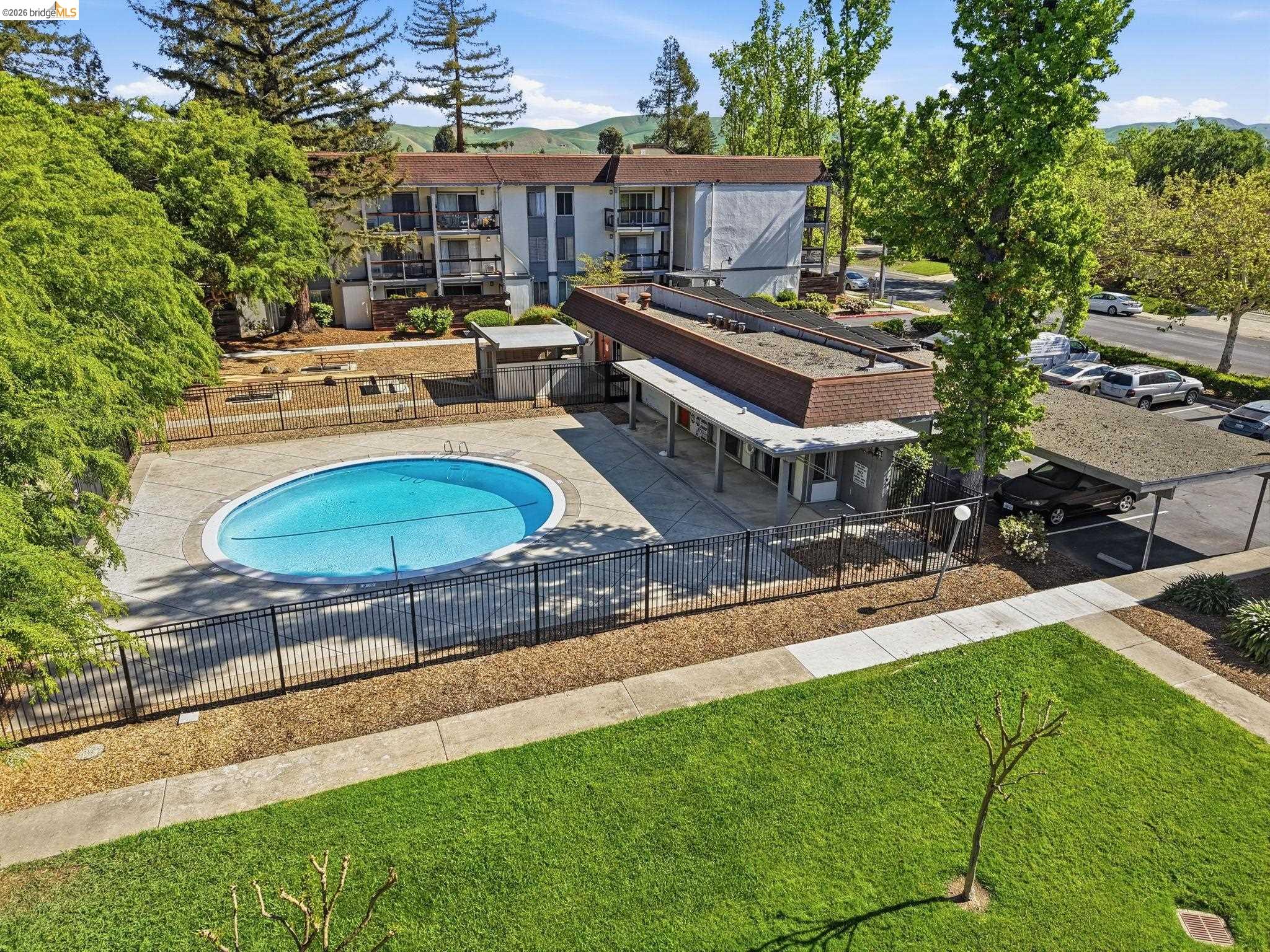 4081 Clayton Road, Unit 118 Concord, CA 94521 - Photo 29 of 30 a front view of house with yard and outdoor seating