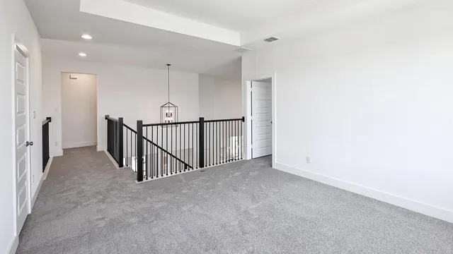 a view of hallway with stairs