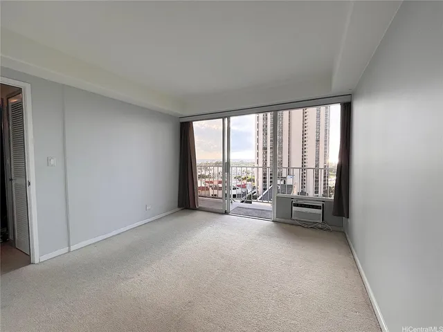 an empty room with sliding door