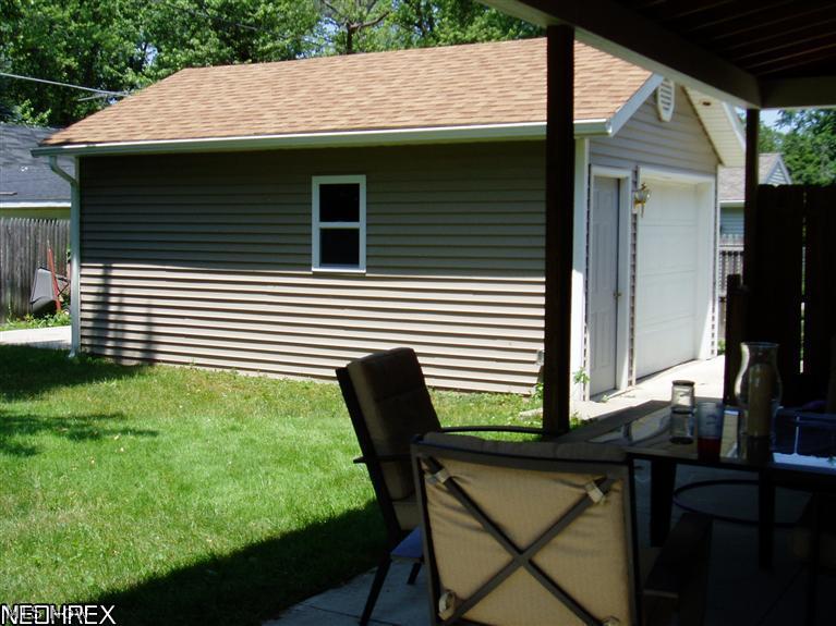 1800 Clyde Road Madison, OH 44057 - Photo 22 of 25 A utility shed is tucked away behind the garage. There is also an additional cement pad can be used as an open patio or additional storage space.