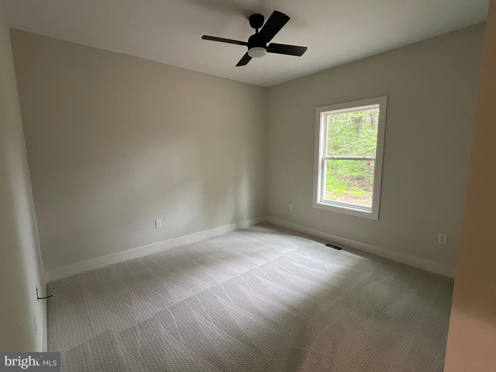 175 Rose Way Colonial Beach, VA 22443 - Photo 29 of 33 a view of an empty room with a window