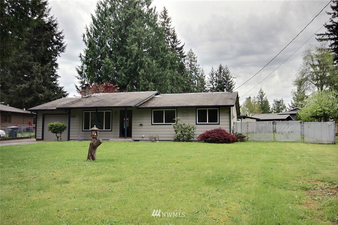 7308 Vandermark Road East Bonney Lake, WA 98391 - Photo 17 of 30 a view of a house with a yard and sitting area