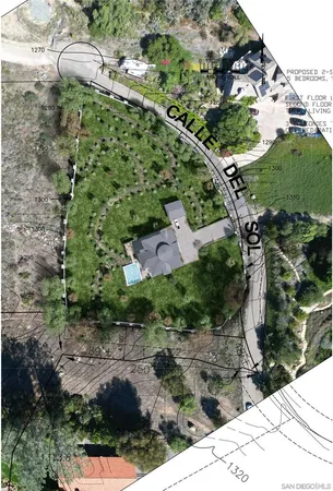 an aerial view of residential house with outdoor space